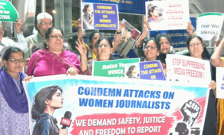 Women journalists protest against attacks and detentions in Hyderabad, holding banners and placards.