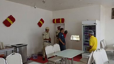 Police and officials inspecting a biryani hotel during raid in Barkas, Hyderabad.