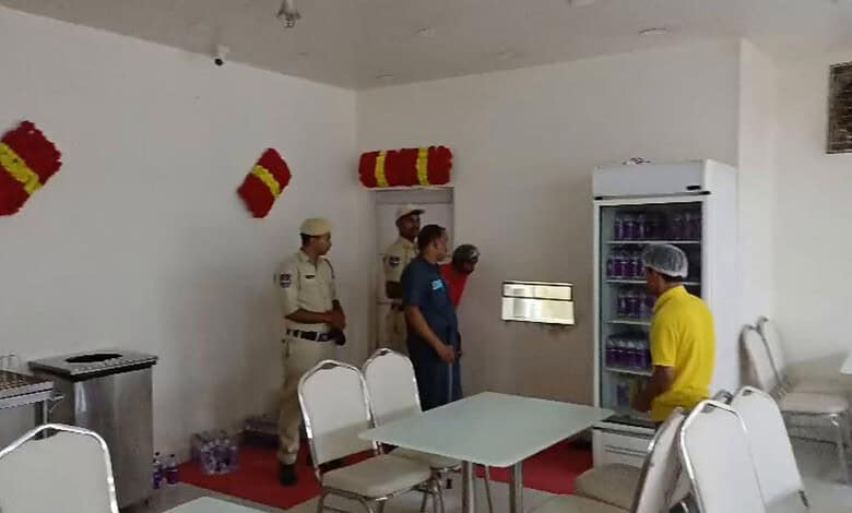 Police and officials inspecting a biryani hotel during raid in Barkas, Hyderabad.