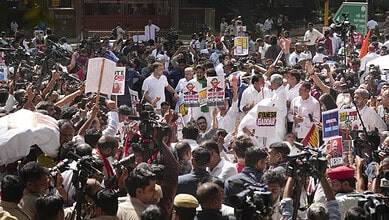 Indian MPs march to Election Commission demanding CEC's resignation amid protests.