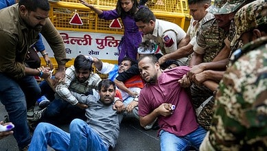 Clash between police and protesters during a demonstration in India.