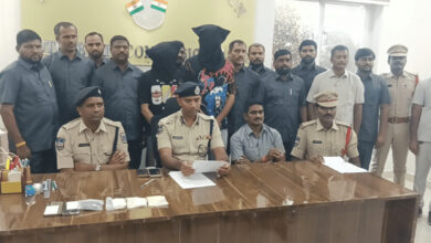 Police officers and suspects during drug bust in Kerala, India.