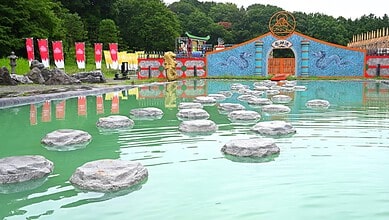 Takeshi's Castle themed amusement park at Shamirpet with stepping stones over water.