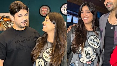 Arjun Bijlani with Neha, both smiling at an event, wearing casual attire.