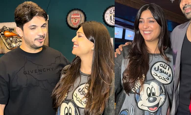 Arjun Bijlani with Neha, both smiling at an event, wearing casual attire.