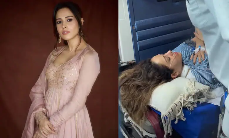 Nushrratt Bharuccha lying on hospital stretcher after Bali accident, receiving medical attention.