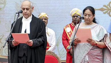 Sudha Yadav sworn in as Karnataka Governor during a formal ceremony with officials and traditional attire.