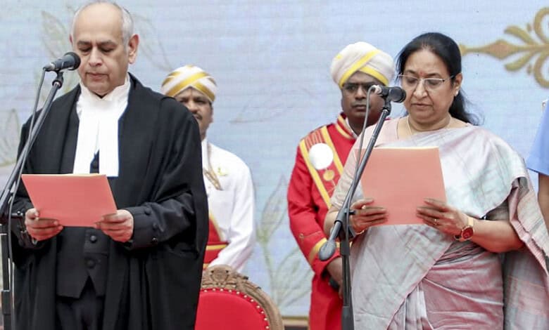 Sudha Yadav sworn in as Karnataka Governor during a formal ceremony with officials and traditional attire.
