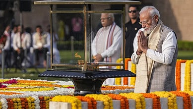 PM Modi pays homage to Mahatma Gandhi at Raj Ghat on Gandhi Jayanti in New Delhi.