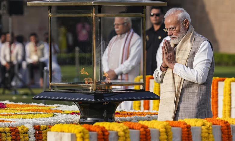PM Modi pays homage to Mahatma Gandhi at Raj Ghat on Gandhi Jayanti in New Delhi.