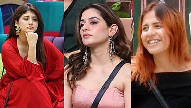 Three female contestants in Bigg Boss 20 during eviction episode, showing varied expressions.