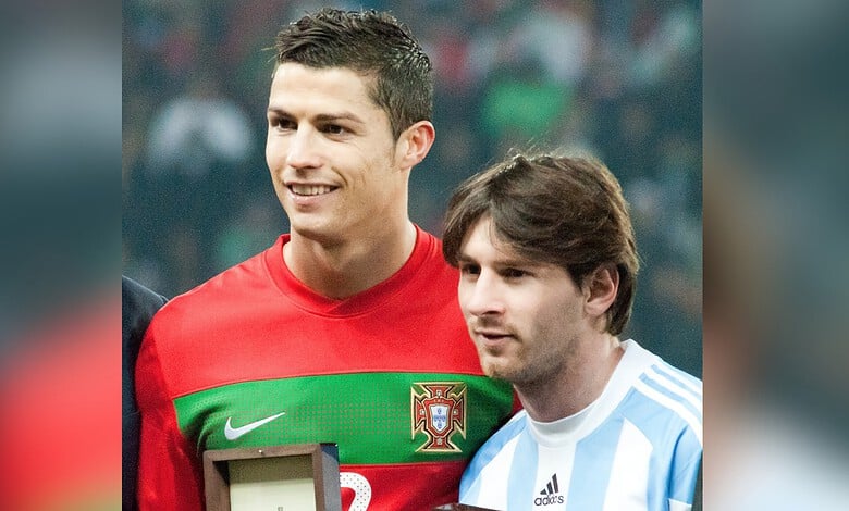 Cristiano Ronaldo and Lionel Messi together, celebrating football achievements.