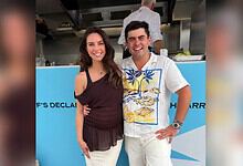 Sarah Todd and Declan Cleary smiling together at a social gathering.