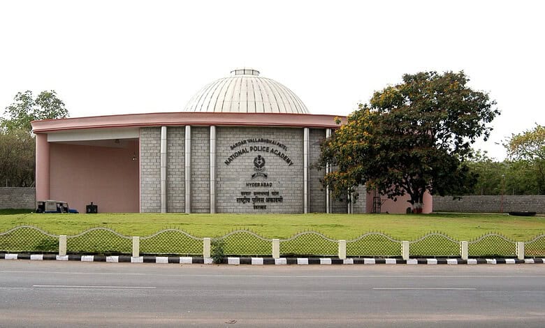Hyderabad Police Academy building with a domed roof and surrounding greenery.
