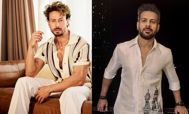 Karanveer Mehra reacts to Tiger Shroff firing incident, wearing a cream shirt and standing outdoors.