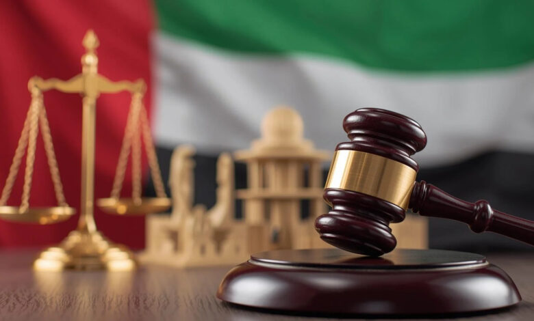 Gavel and scales of justice with the Indian flag in the background.