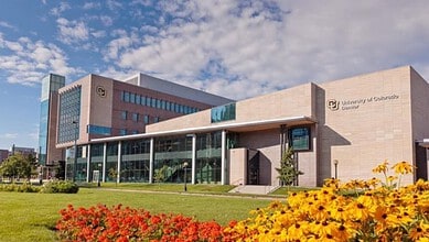 University of Colorado Denver Hyderabad campus building with modern architecture and landscaped gardens.