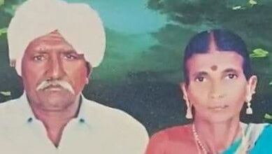 Somber image of an elderly couple with serious expressions, outdoors in a natural setting.