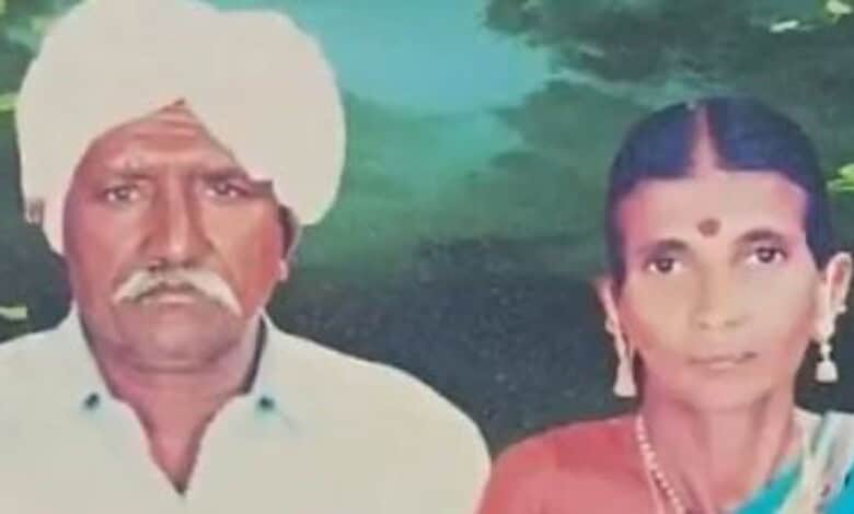Somber image of an elderly couple with serious expressions, outdoors in a natural setting.
