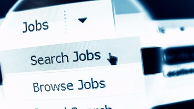 Search jobs online on a digital platform with a cursor pointing at 'Search Jobs' option.