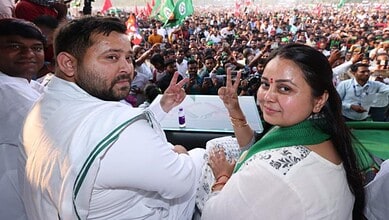 Lalu's daughter and Tejashwi at a political rally with a large crowd in the background.