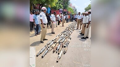 Warangal traffic police crush modified silencers