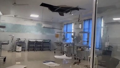 Ceiling collapse at Bhupalpally government hospital causing damage to medical equipment.