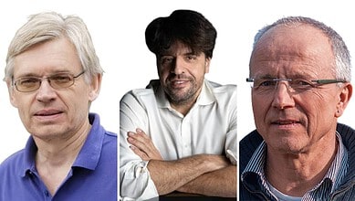 Three scientists involved in brain activity research, smiling and posing for the photo.