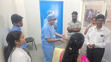 Medical staff and family members in discussion at LV Prasad Eye Institute.