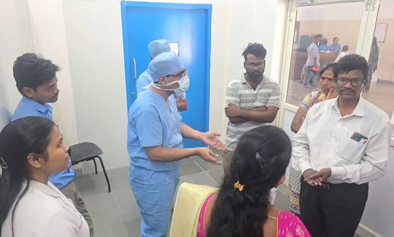 Medical staff and family members in discussion at LV Prasad Eye Institute.