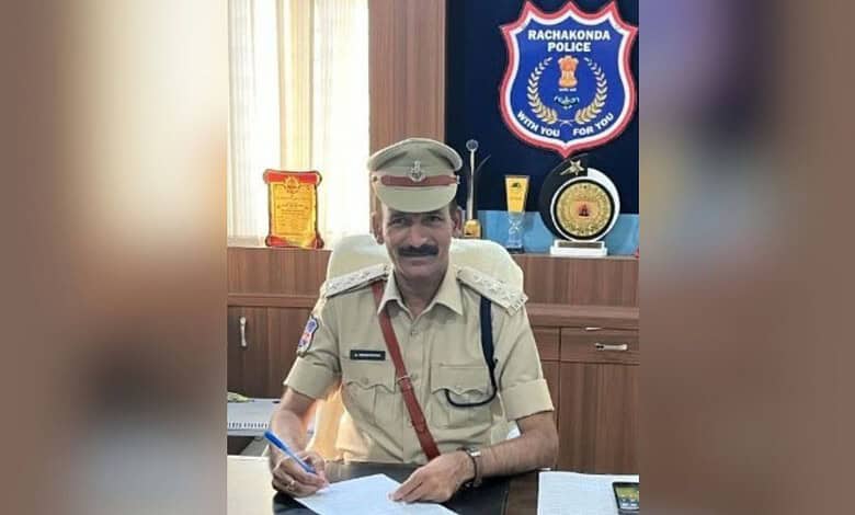 Telangana police officer in uniform at Rachakonda Police station office.