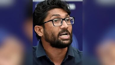 Jignesh Mevani speaking passionately during a public event in Gujarat.