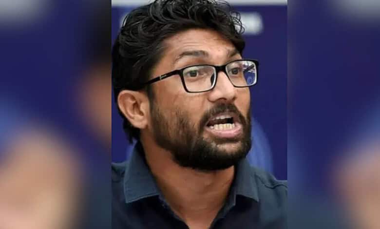 Jignesh Mevani speaking passionately during a public event in Gujarat.