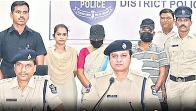 Police officers and suspects during a press conference in Kamareddy, India.