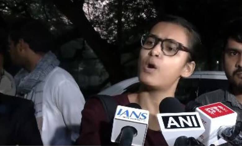 Neha Bora addreses the media after being released from detention
