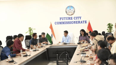 Top police officials and government officials discuss security at Future City Commissionerate meeting.