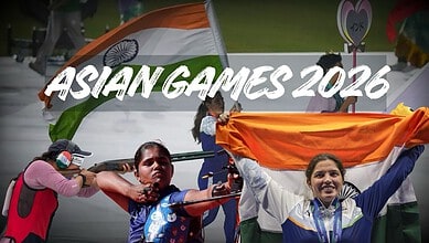 Indian athletes celebrate with flags at Asian Games 2026 event.