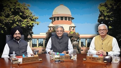 Indian officials at a conference table outside the Supreme Court of India building.