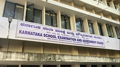 Karnataka School Examination and Assessment Board banner on a building facade.