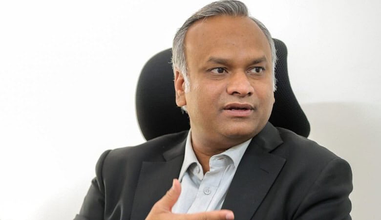 Priyank Kharge speaking during a public event or press conference.