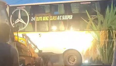 Bus with Mercedes-Benz logo and 'Elite Benz Class A/C Sleeper' signage near Piriyapatna.