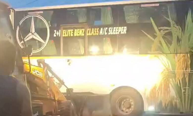 Bus with Mercedes-Benz logo and 'Elite Benz Class A/C Sleeper' signage near Piriyapatna.
