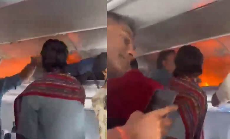 Passengers evacuate an airplane after a fire caused by a power bank on board.