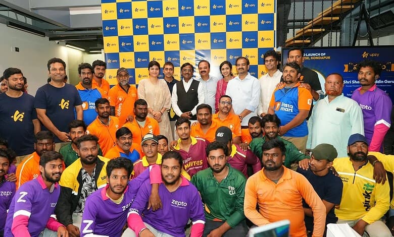 Group photo of diverse athletes and officials at TGPWU event with colourful team jerseys.