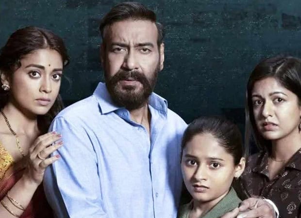 The cast of Drishyam 3 featuring Ajay Devgn and others in a dramatic scene.