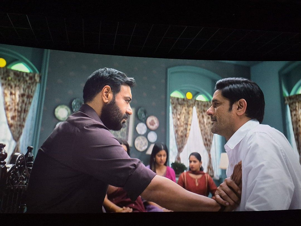 Intense scene from Drishyam 3 showing two men in a heated confrontation in a domestic setting.