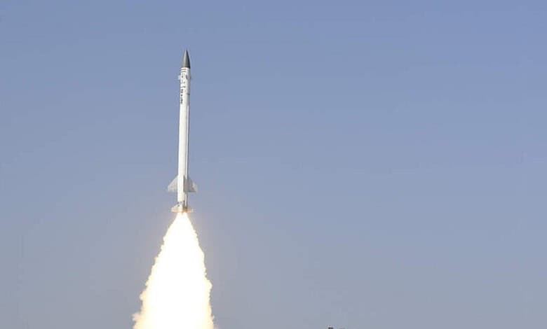 Interceptor missile launching into the sky.