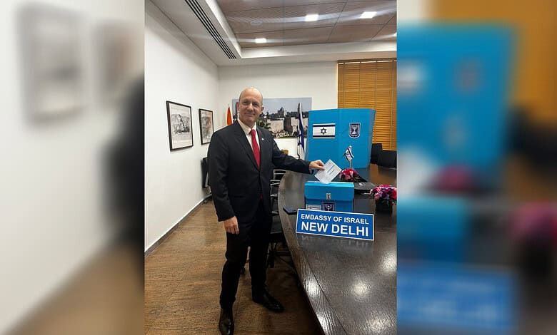 Israeli Ambassador Reuven Azar casts his ballot at the Israeli Embassy in New Delhi.
