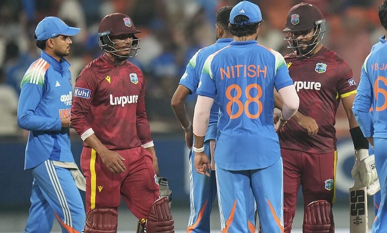 Cricket players from India and West Indies on the field during a match.