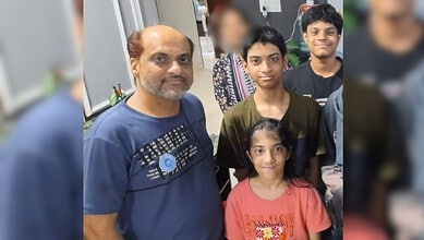 Family gathering at a funeral in Riyadh, with a man and children present.